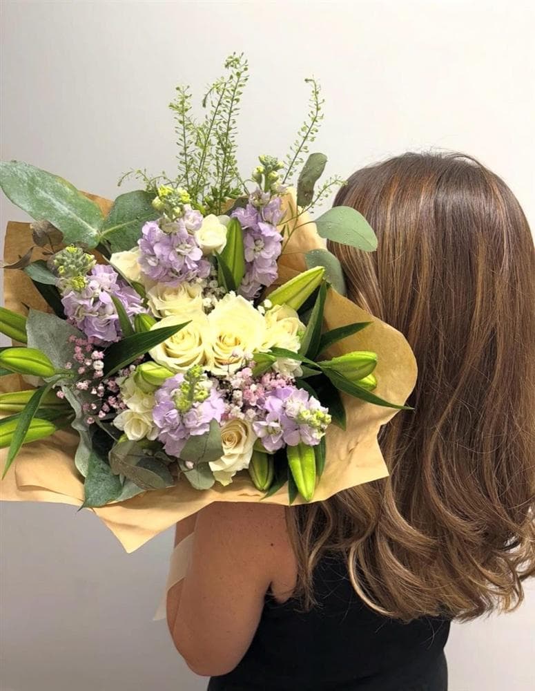 Lilac, white rose and lily bouquet